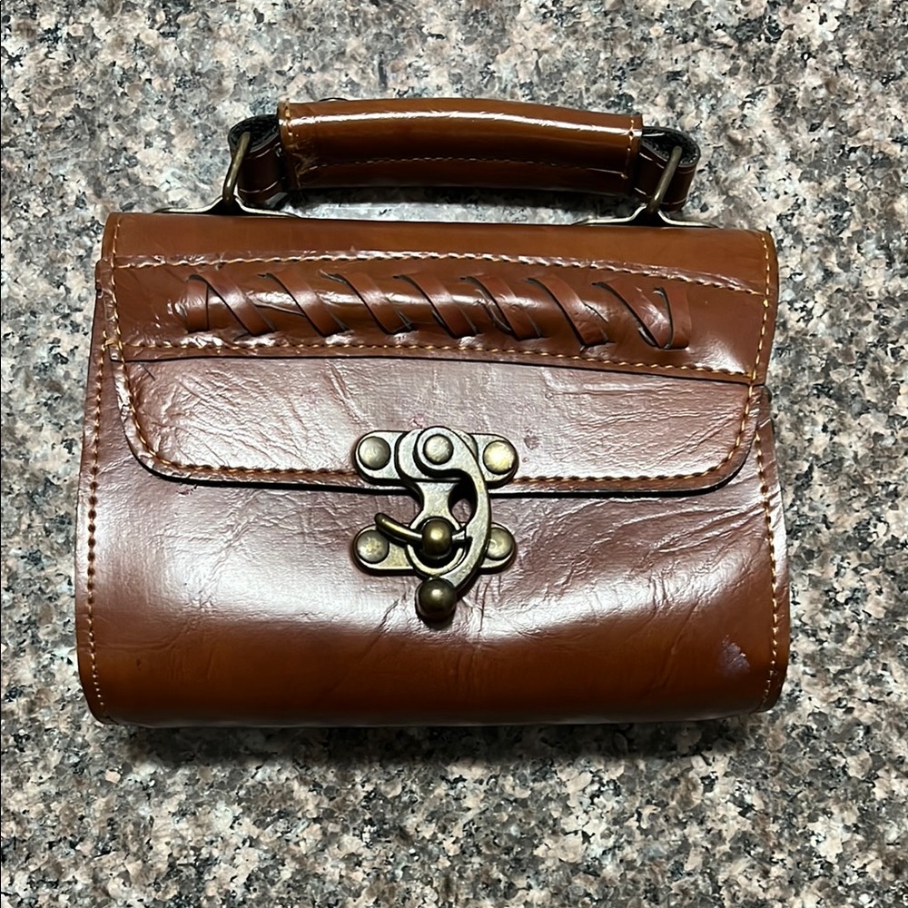 Brown Leather Handbag with Unique Clasp